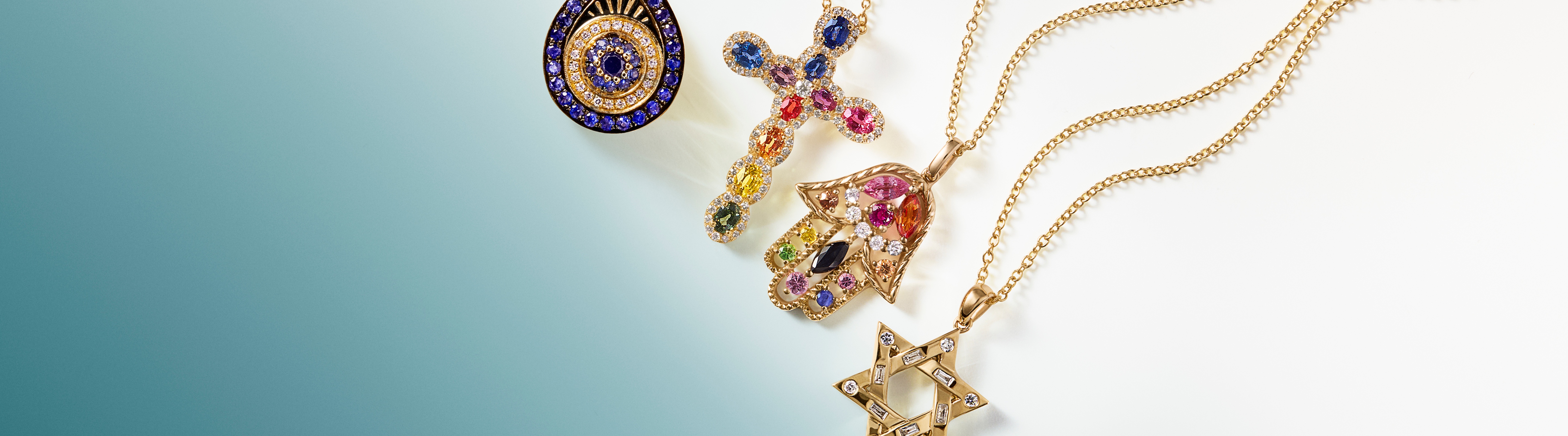 Four gold jewelry pieces with colorful gemstones are displayed on a gradient teal-to-white background, including two pendants, a ring, and a Star of David necklace.