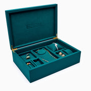 Effy Signature Jewelry Box with 7-piece removable inserts in teal velvet features organized compartments, removable trays, a pillow, and a round section. Open the box to display versatile storage options, with the ESPY brand name elegantly embossed inside the lid.