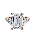 The 14K Rose Gold 3-Stone Engagement Ring features a center diamond accented by two trillion side stones, totaling 0.25TCW, all set in secure prongs.