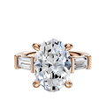 The 18K Rose Gold 3-Stone Baguette East/West Side Stones 0.25TCW Engagement Ring features a central diamond and two baguette-cut side stones, shown on a plain white background.