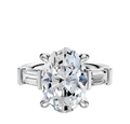 The Platinum 3-Stone Baguette East/West Side Stones 0.25TCW Engagement Ring features a center stone flanked by baguette-cut side stones, shown against a plain white background.