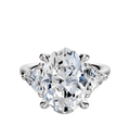 An 18K white gold engagement ring showcasing a center stone with two trillion-cut side diamonds (0.25TCW) set in a polished three-stone band, displayed against a white background.