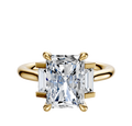 The 18K Yellow Gold 3-Stone Baguette Side Stones Set North/South 0.125TCW Ring features a central rectangular diamond with two smaller baguette diamonds on each side, displayed against a plain white background.
