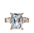 A 14K rose gold engagement ring featuring a large center baguette gemstone held by four prongs, flanked by two horizontally set baguette side stones for a total carat weight of 0.25.