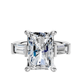 The Platinum 3-Stone Baguette East/West Side Stones 0.25TCW Engagement Ring showcases a radiant center stone with two smaller baguette diamonds on each side, set on a sleek platinum band.
