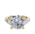 The 14K Yellow Gold 3-Stone Pear Side Stones 0.25TCW Engagement Ring showcases a round brilliant center diamond flanked by two pear-shaped side stones, set against a white background.
