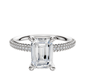 The Platinum 4 Prong Basket Classic Dome 3-Row-Pave 2.0mm Engagement Ring features a center stone in a four-prong setting, with a band adorned with three rows of pave-set diamonds, shown against a plain white background.