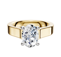 An 18K two-tone engagement ring with a flat 4.0mm band featuring a large diamond solitaire in a 4-prong hidden halo cathedral setting.