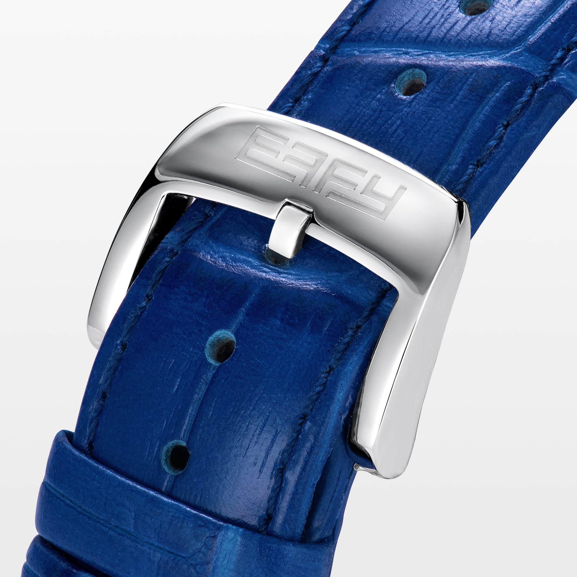 The 38MM Swiss Made Stainless Steel watch features a diamond-encrusted silver case, blue topaz hour markers, textured silver geometric dial with the EAFY logo, and a blue leather strap for a luxurious finish.