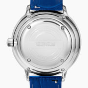 The 38MM Swiss Made Stainless Steel Spinning Starfish Watch features diamonds, blue topaz, a blue leather strap, silver face with blue accents, silver hands, the EARY logo on the dial, and a jeweled starfish motif near the bottom.