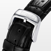 The 39MM Swiss Made Stainless Steel Watch with Diamonds showcases a round diamond-encrusted bezel, mother-of-pearl dial with silver numerals, and a black leather strap, elegantly set against a plain white background.