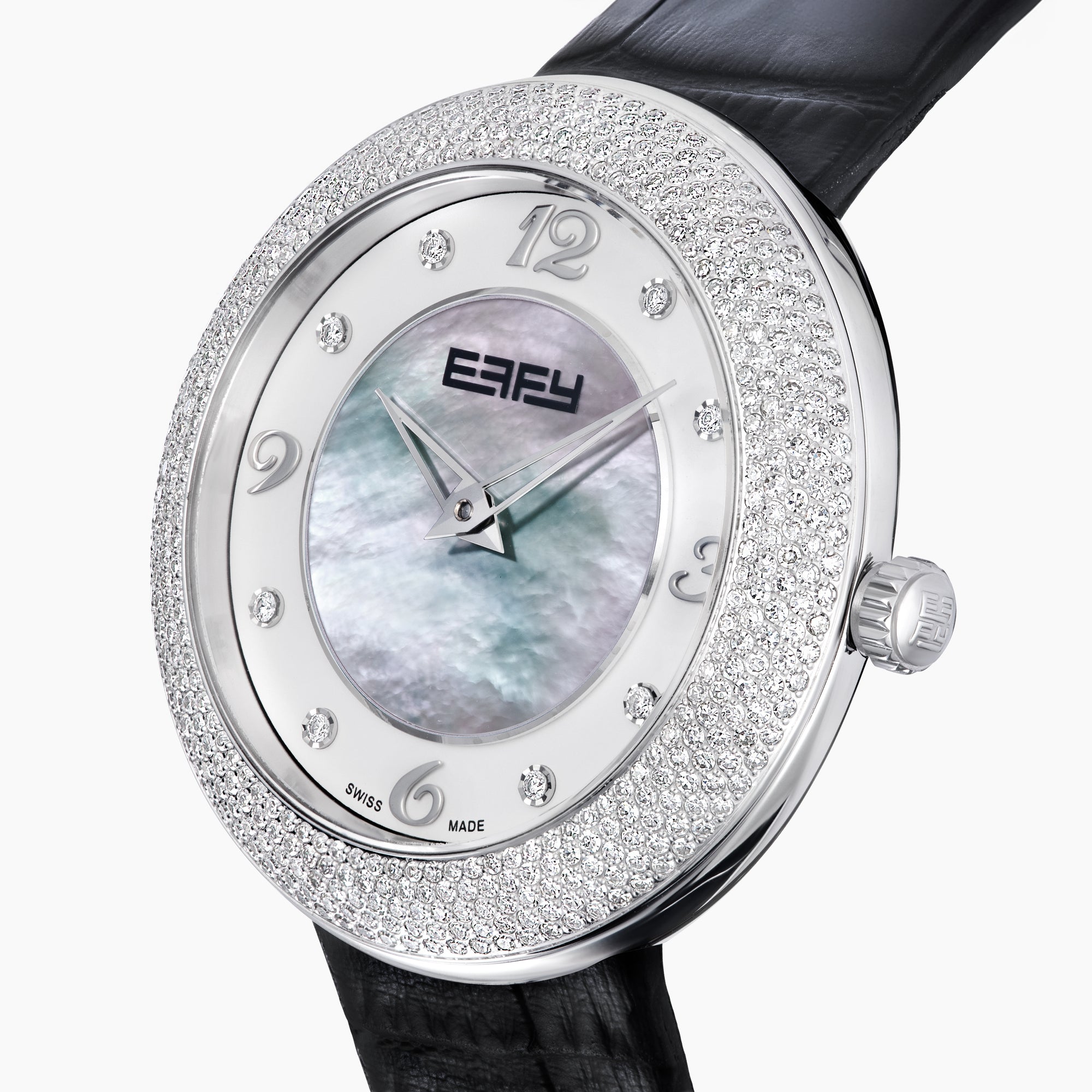 The 39MM Swiss Made Stainless Steel Watch with Diamonds showcases a round diamond-encrusted bezel, mother-of-pearl dial with silver numerals, and a black leather strap, elegantly set against a plain white background.