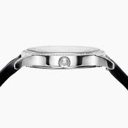 The 41MM Swiss Made Stainless Steel Signature Panther Watch with Diamonds features a jeweled panther design with black spots, emerald eyes, and a diamond-studded face, displaying the time in a small subdial.