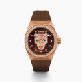 Experience the elegance of the 38MM Swiss Made 18K Rose Gold Signature Panther Automatic Watch with Diamond Bezel, showcasing a sophisticated brown strap, an 18K rose gold-tone case adorned with diamond accents, and a dazzling diamond pavé panther motif on the dial with captivating green gemstone eyes and the distinctive EARLY branding at the top.