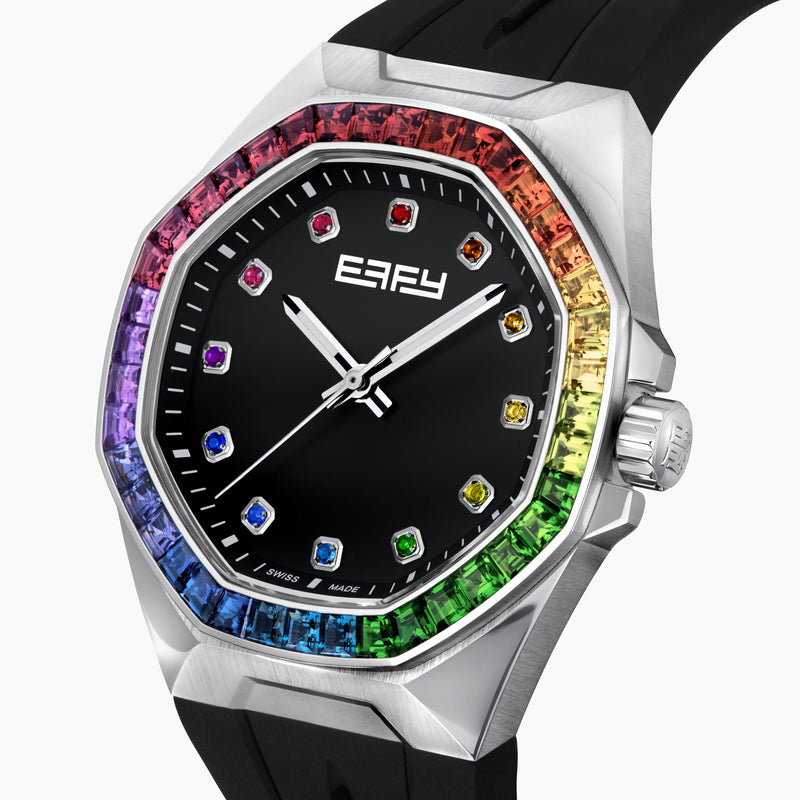 The 42MM Swiss Made Stainless Steel Automatic Watch features a black strap, silver case, black dial, rainbow gemstones on the bezel and hour markers, silver hands, and the EALEY logo in white at the top.