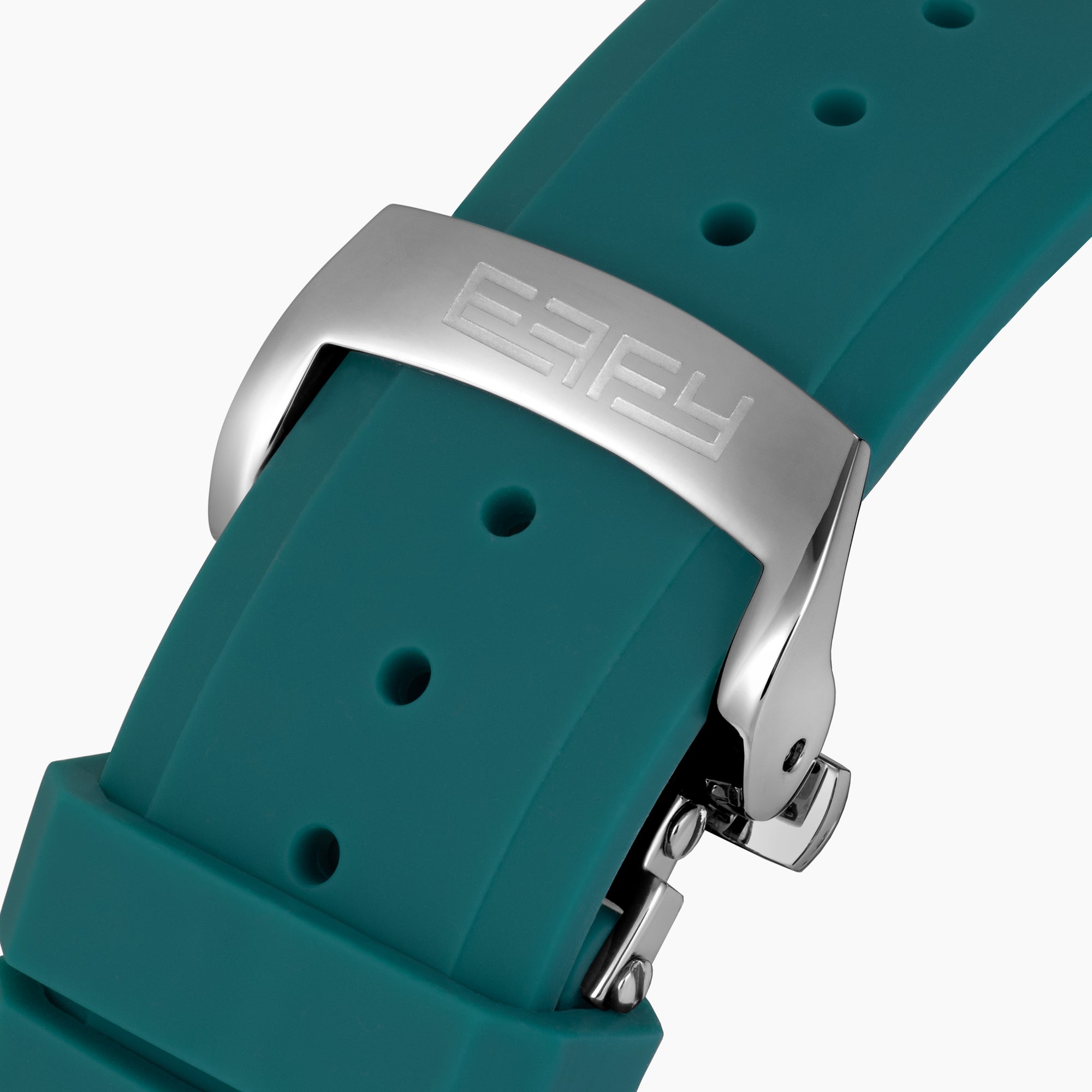 The 42MM Swiss Made Stainless Steel Automatic Skeleton Watch with Diamonds features a teal rubber strap, silver case, partially transparent dial with visible gears, teal bezel and markings, and EBFY branding at the top.