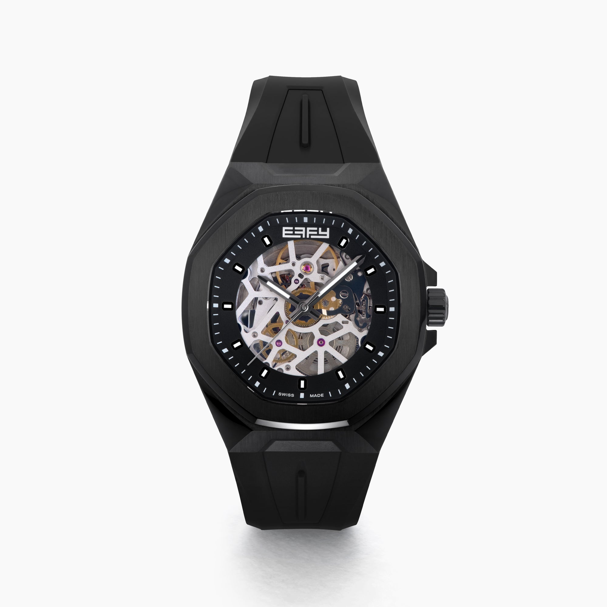 The 42MM Swiss Made Stainless Steel with Black PVD Automatic Skeleton Watch features a skeleton dial, black rubber strap, hexagonal case, and the white BEFY logo at the top against a plain white background.