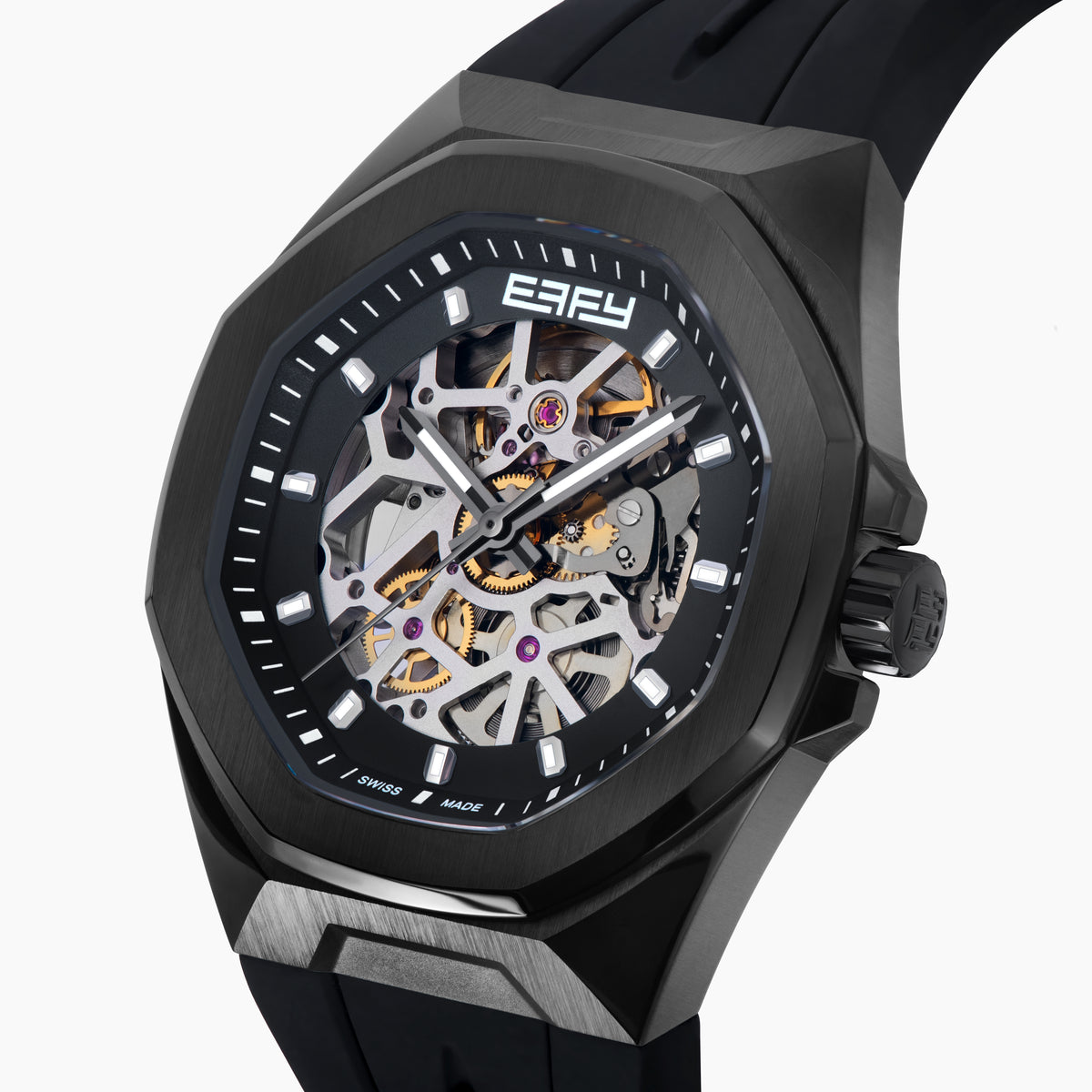 The 42MM Swiss Made Stainless Steel with Black PVD Automatic Skeleton Watch features a skeleton dial, black rubber strap, hexagonal case, and the white BEFY logo at the top against a plain white background.