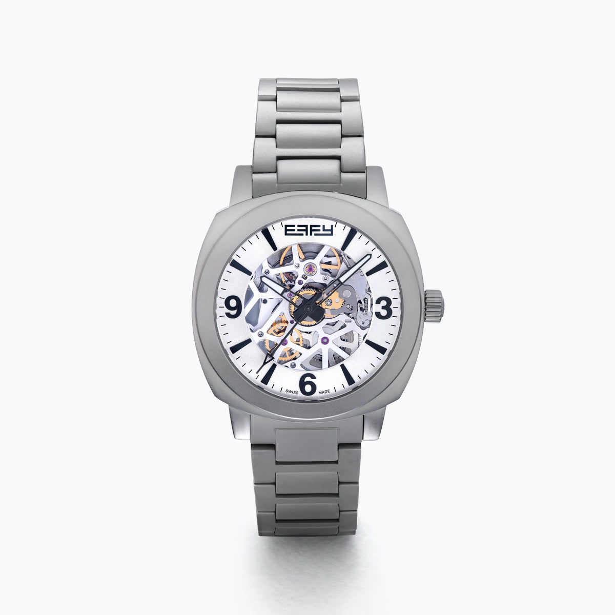 The 41MM Swiss Made Stainless Steel Automatic Skeleton Watch features a silver metal band, white face, black hour markers, and an open skeleton dial displaying inner gears. "ESPY" is printed below the 12 o’clock position.