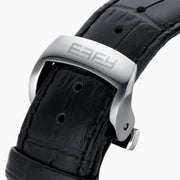 The 41MM Swiss Made Stainless Steel and Leather Automatic Skeleton Watch features a black leather strap, silver case, black skeleton dial, and white hour markers with numerals at 3, 6, and 9 to showcase Swiss precision craftsmanship.
