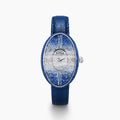 The 28MM Swiss Made Stainless Steel Cocktail Watch features a luxurious oval design with a diamond and blue sapphire-studded face, silver hands, deep blue textured leather strap, and exquisite Swiss craftsmanship.