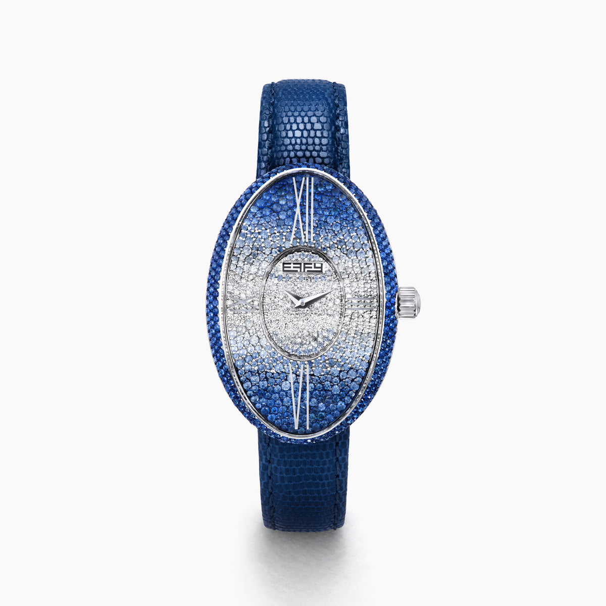 The 28MM Swiss Made Stainless Steel Cocktail Watch features a luxurious oval design with a diamond and blue sapphire-studded face, silver hands, deep blue textured leather strap, and exquisite Swiss craftsmanship.