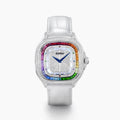 The 39MM Swiss Made Stainless Steel Watch features a white leather strap, mother of pearl dial, diamond-studded face, rainbow sapphire bezel, blue hands, and silver case.