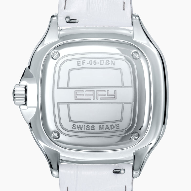 The 39MM Swiss Made Stainless Steel Watch features a white leather strap, mother of pearl dial, diamond-studded face, rainbow sapphire bezel, blue hands, and silver case.