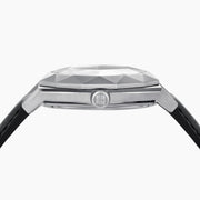 The 36MM Black Dial Swiss Made Titanium Watch with Diamonds features a faceted silver titanium case, black dial adorned with diamond hour markers, and a black leather strap, showcased against a plain white background.