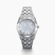 A Swiss made timepiece, the 36MM Titanium Watch with Diamonds showcases a silver geometric metal band and a faceted bezel, complemented by a light blue mother-of-pearl dial accented with diamond hour markers.