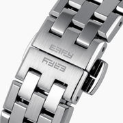 Introducing the 36MM Blue Dial Swiss Made Titanium Watch with Diamonds, featuring a sleek titanium strap, an eye-catching turquoise blue dial, silver hour markers, and dazzling diamond accents at each hour position. This exquisite timepiece captures the refined elegance of Swiss craftsmanship and is beautifully displayed on a white background.
