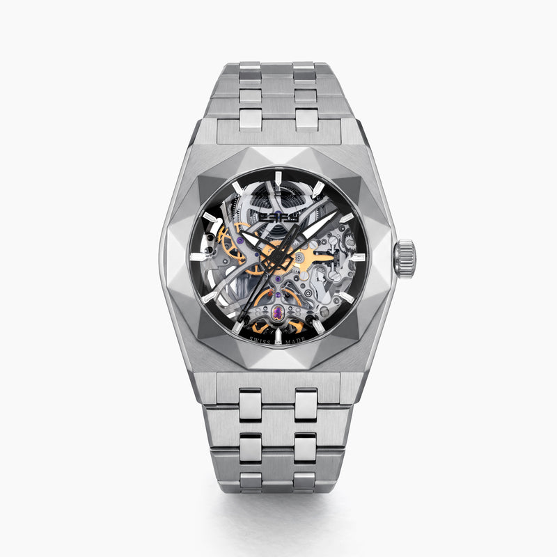 A 42MM Swiss made titanium automatic skeleton watch featuring a geometric bezel that reveals intricate gears and movements beneath the dial, complemented by a metal link bracelet.
