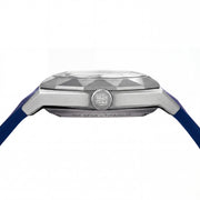 Introducing the 42MM Swiss Made Titanium and Silicone Automatic Skeleton Watch—a luxurious timepiece featuring a geometric silver titanium case and exposed inner mechanisms. Accented with a blue bezel and paired with a blue silicone strap, this design stands out against a white backdrop. Its exceptional clarity and elegance are enhanced by a diamond-cut sapphire crystal.