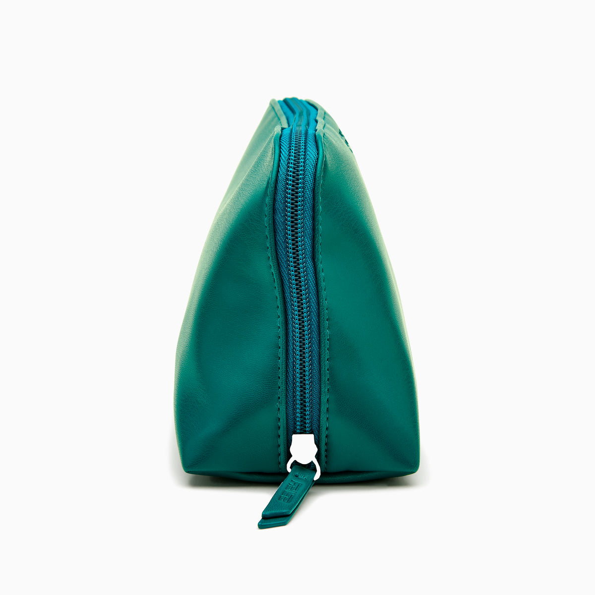 The Effy 2-Piece Travel Pouch set—two teal vegan leather pouches (one large, one small) with embossed logos—is displayed on a white drawstring bag with a matching logo, all set against a plain white background.