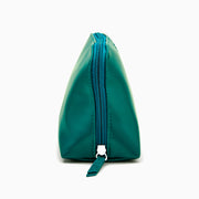 The Effy 2-Piece Travel Pouch set—two teal vegan leather pouches (one large, one small) with embossed logos—is displayed on a white drawstring bag with a matching logo, all set against a plain white background.