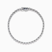 The Lab Grown Round Diamond 5.00ct Cupcake Setting Tennis Bracelet in 14K White Gold features a slender band adorned with a continuous row of sparkling lab grown diamonds.