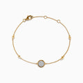 Novelty 14K Yellow Gold Diamond Bracelet, 0.09 TCW, features a central round pendant with sparkling diamonds, gold bead accents along the chain, and a secure lobster clasp closure.