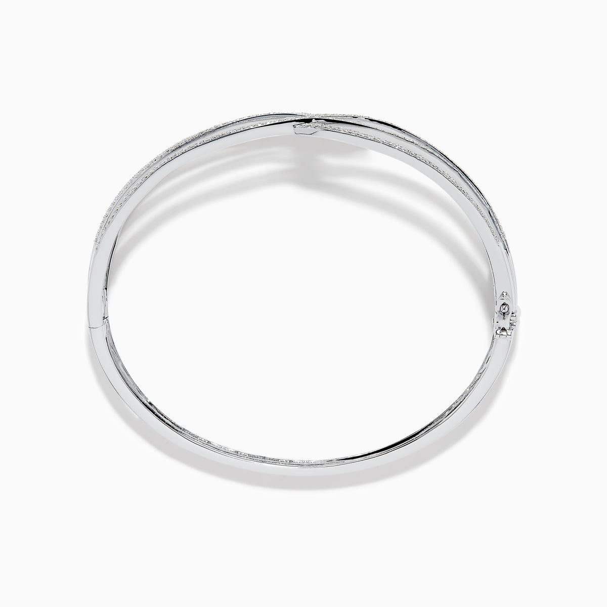 The 14K White Gold Pave Diamond Crisscross Bangle features an open, wavy design adorned with sparkling diamonds along the curves for an elegant, delicate look.