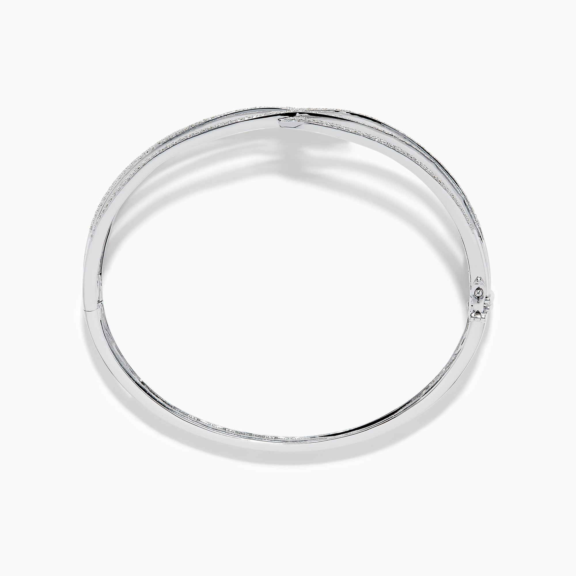 The 14K White Gold Pave Diamond Crisscross Bangle features an open, wavy design adorned with sparkling diamonds along the curves for an elegant, delicate look.