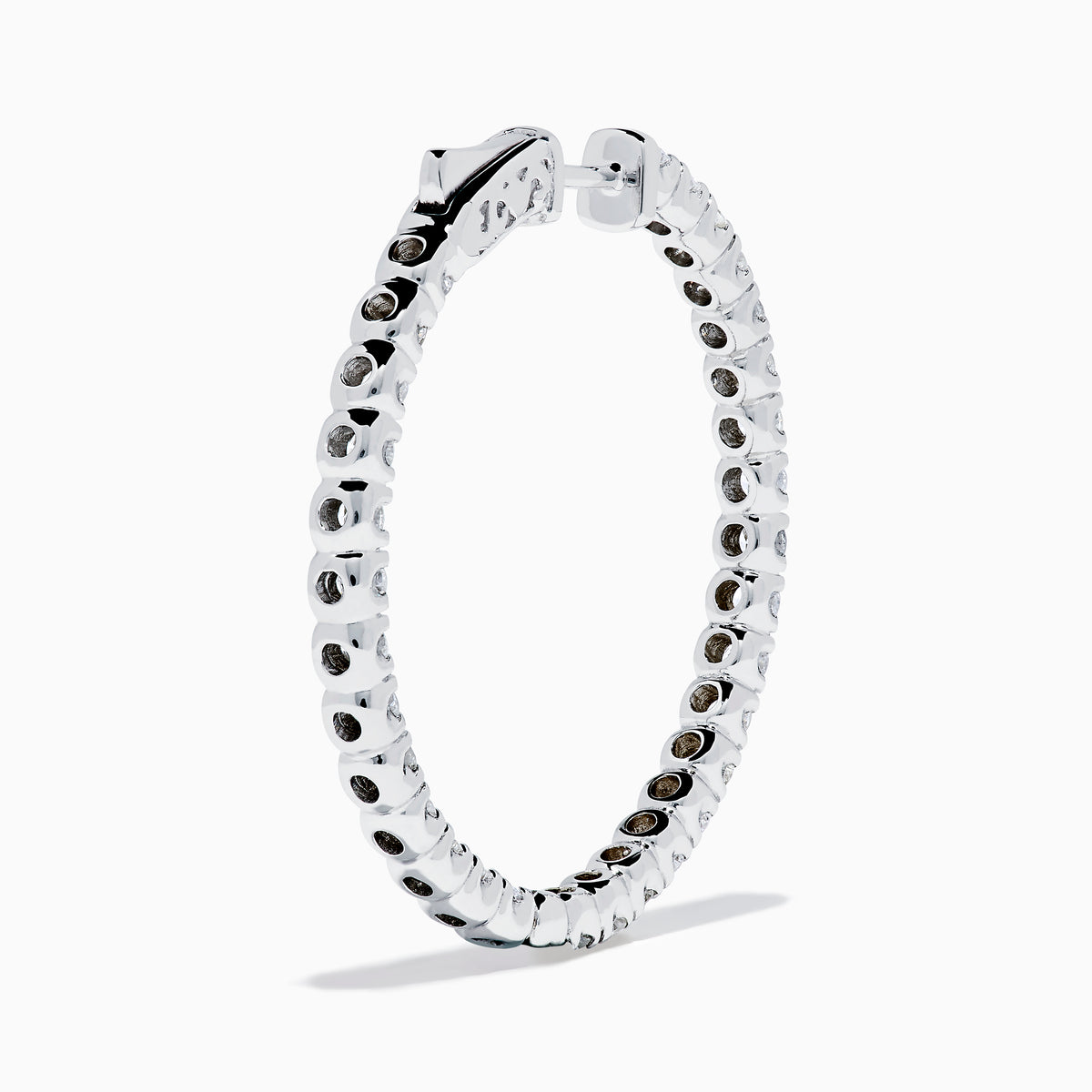The 14K White Gold Inside Out Diamond Hoop Earrings (2.00 TCW) are shown vertically on a plain white background, with their shadows cast to the side.