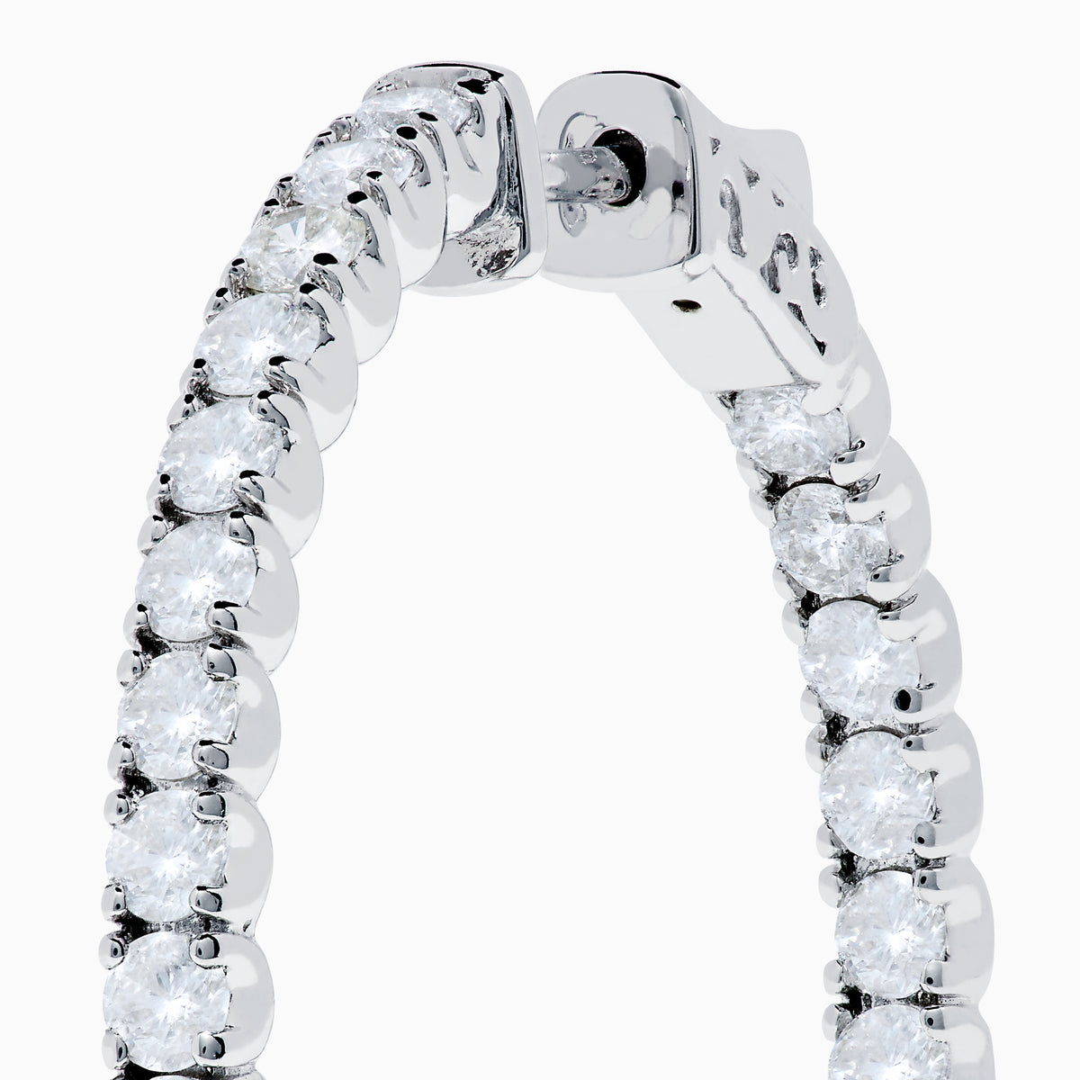 The 14K White Gold Inside Out Diamond Hoop Earrings (2.00 TCW) are shown vertically on a plain white background, with their shadows cast to the side.