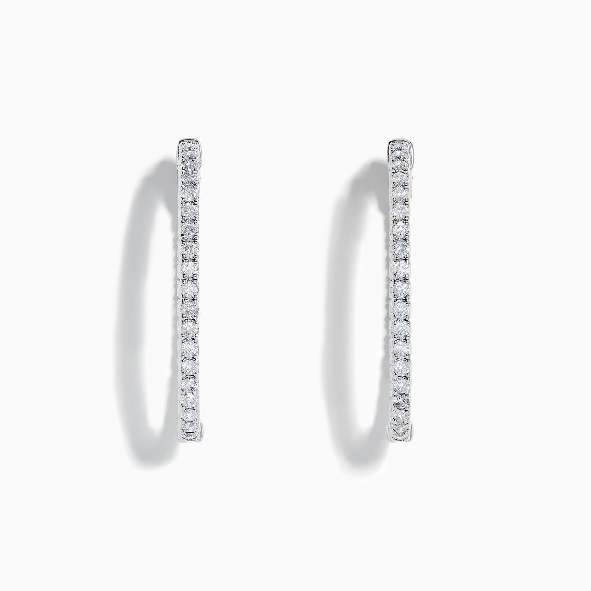 A pair of 14K white gold Inside Out Diamond Oval Earrings, 2.00 TCW, featuring sparkling diamonds, displayed against a plain white background.
