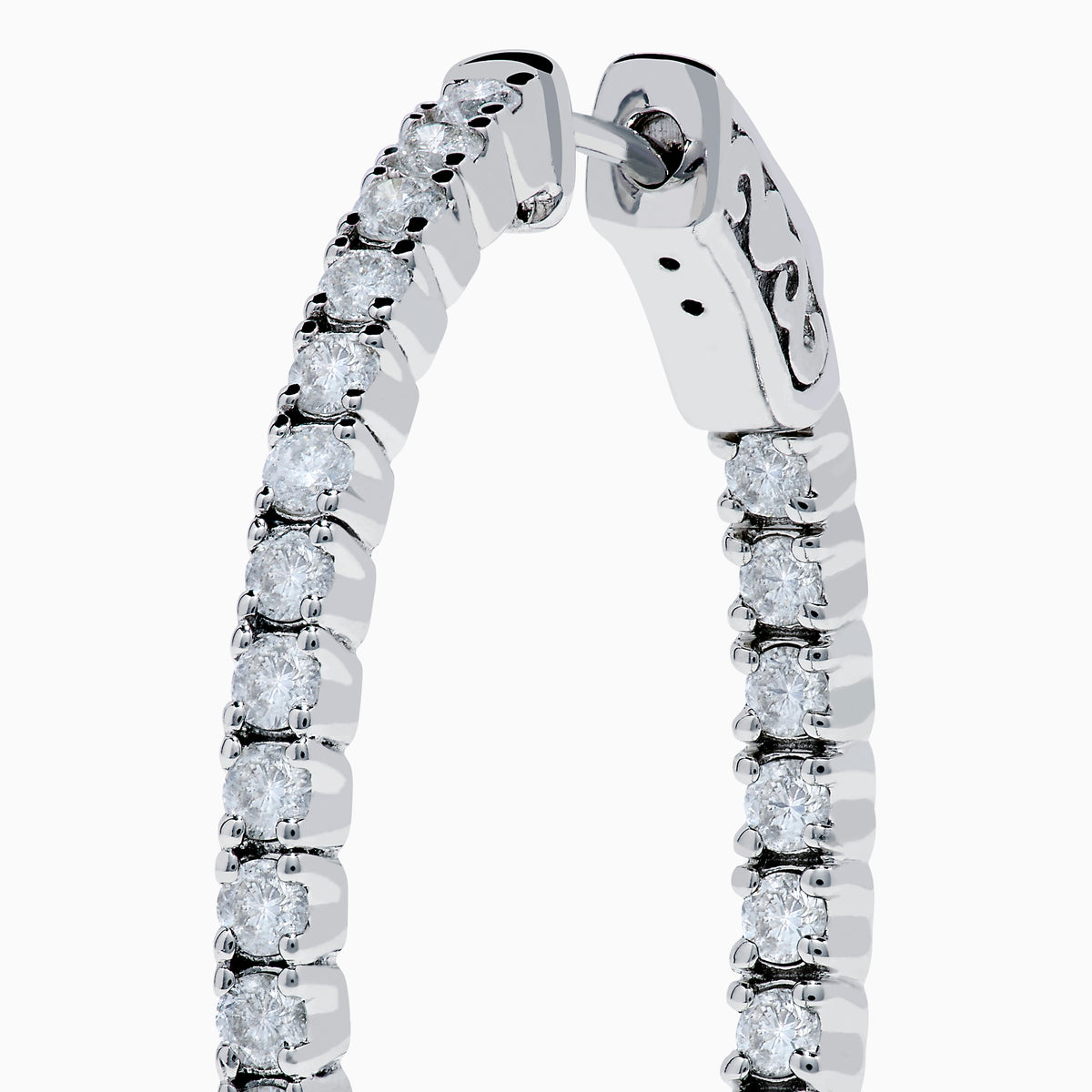 A pair of 14K white gold Inside Out Diamond Oval Earrings, 2.00 TCW, featuring sparkling diamonds, displayed against a plain white background.
