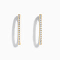 A pair of 14K Yellow Gold Inside Out Diamond Oval Earrings, 2.00 TCW, featuring small round diamonds and displayed against a plain white background.