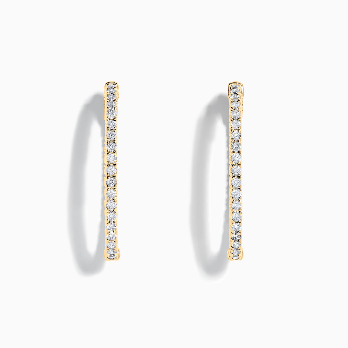 A pair of 14K Yellow Gold Inside Out Diamond Oval Earrings, 2.00 TCW, featuring small round diamonds and displayed against a plain white background.