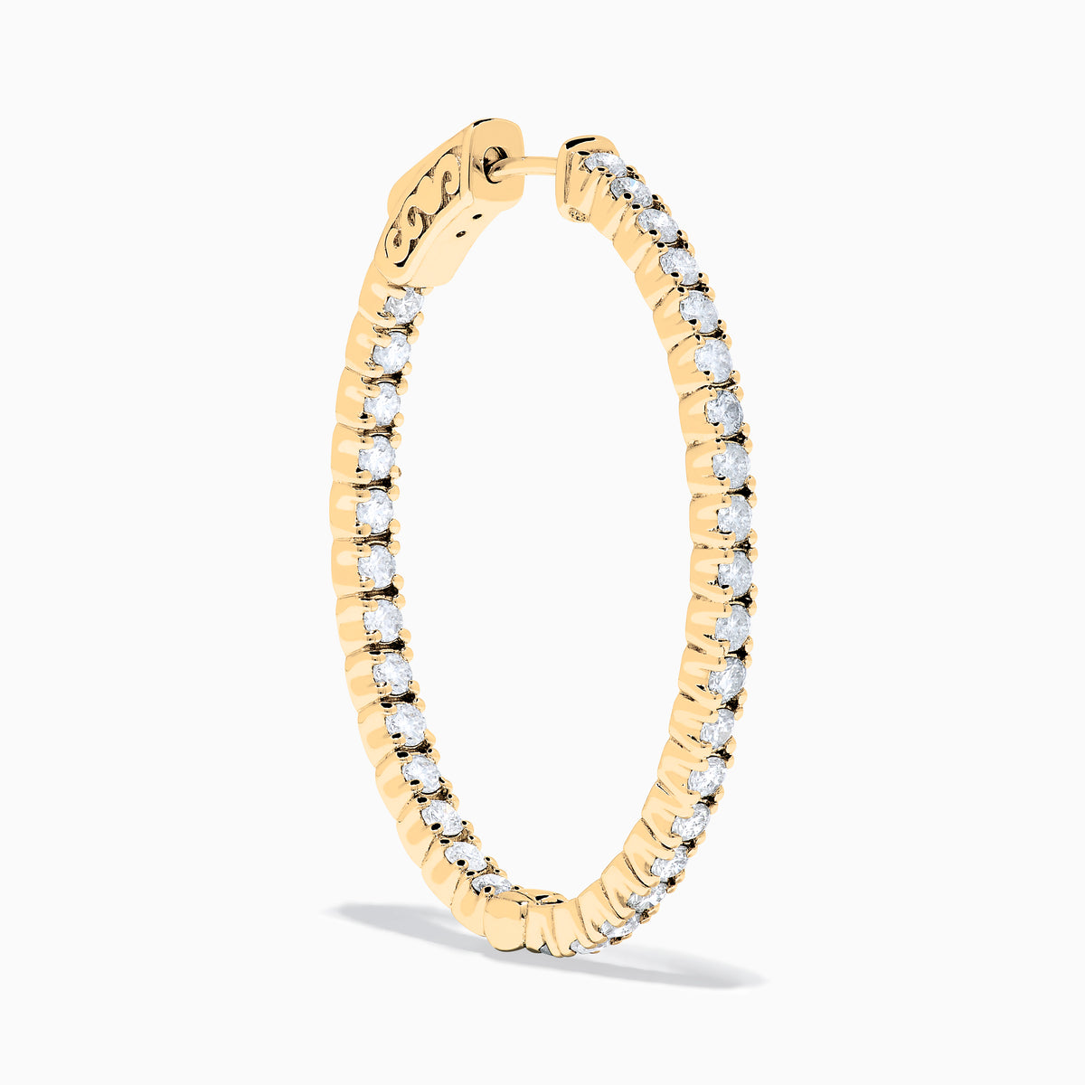 A pair of 14K Yellow Gold Inside Out Diamond Oval Earrings, 2.00 TCW, featuring small round diamonds and displayed against a plain white background.