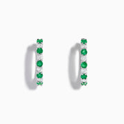 The 14K White Gold Emerald & Diamond Hoop Earrings, 1.35 TCW, feature alternating round emeralds and diamonds, showcased on a white background.