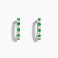 A pair of 14K Yellow Gold Emerald & Diamond Hoop Earrings, 1.35 TCW, featuring alternating round emeralds and diamonds, displayed on a white background.