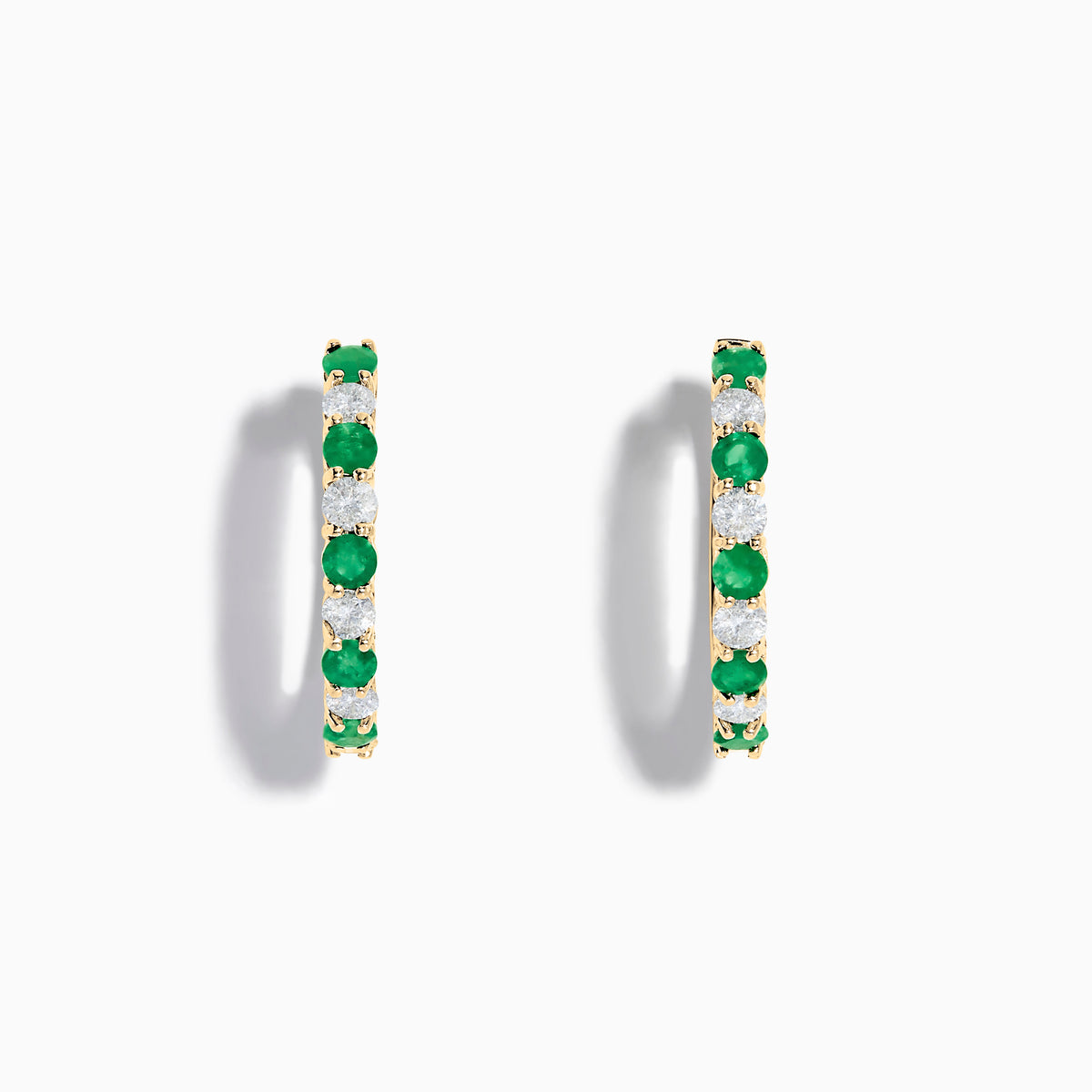 A pair of 14K Yellow Gold Emerald & Diamond Hoop Earrings, 1.35 TCW, featuring alternating round emeralds and diamonds, displayed on a white background.