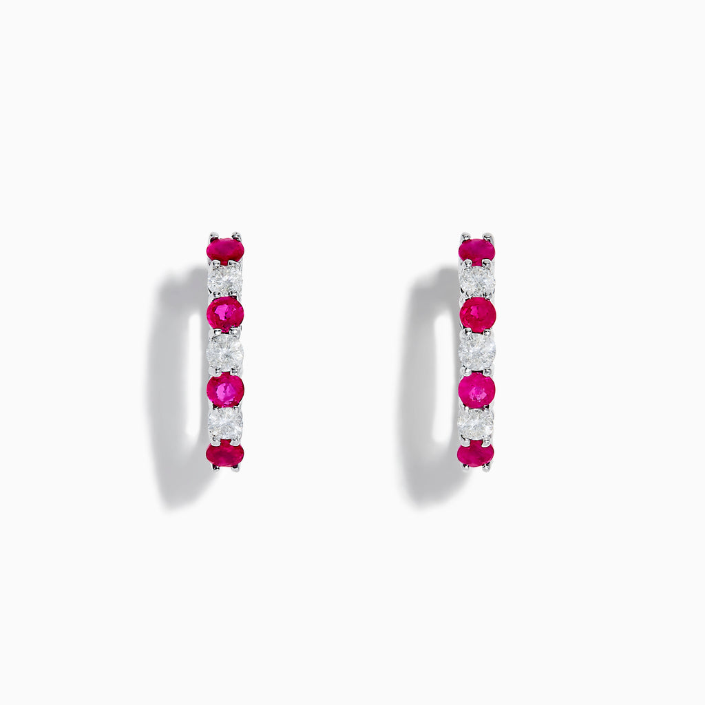 A pair of 14K White Gold Ruby & Diamond Hoop Earrings, 1.10 TCW, featuring alternating round red rubies and clear diamonds, displayed on a white background with each earring casting a soft shadow.